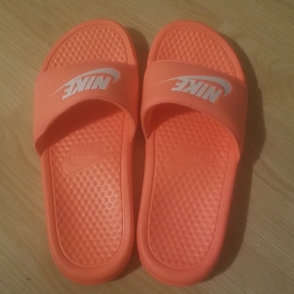 neon orange nike slides